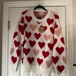 Cute heart BiBi long sleeve sweater with pearls on front and sleeves.size XL